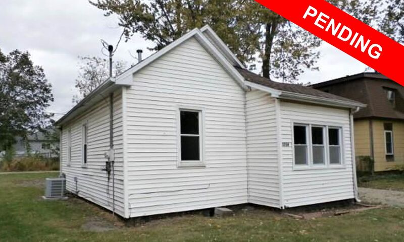 Needs updates but priced to sell. This 1886 bungalow features two bedrooms, one bathroom, a rear deck, and an older mower shed. The roof, furnace, central air, and sewer line were all replaced within the last 3 years. The windows and storm doors are from 2012. *Broker Owned*  $24,900